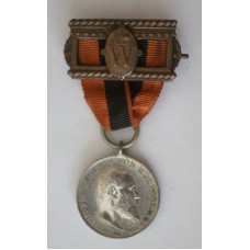 Wurttemburg King Karl Jubilee Foundation Recognition Medal in silver with bronze ribbon bar 