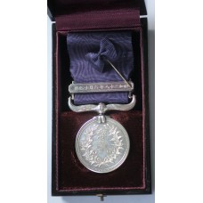 Merit Medal on dark navy ribbon in box of issue with lapel bow 