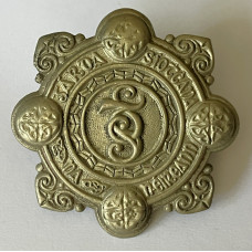 Irish Garda white metal cap badge from the 1950s 