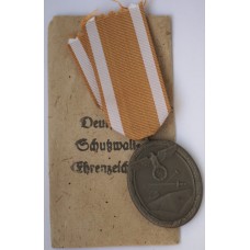 West Wall Medal in packet of issue 