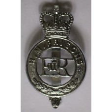 H M Prisons cap badge
