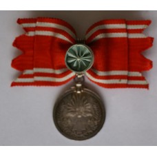 Japanese Red Cross Life Member's Medal on female bow ribbon