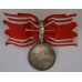 Japanese Red Cross Life Member's Medal on female bow ribbon