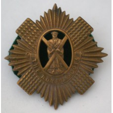 The Royal Scots WWI era economy brass cap badge 